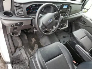 2023 Ford Transit Cargo с VIN 1FTBR1C87PKA31959, выставлен на аукционе Copart как лот 51645315 с пробегом 39 150 миль миль и На запчасти • Non repairable. История ставок и продаж доступна на DreamBid. Изображение 8.