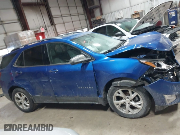 2019 Chevrolet Equinox Premier with VIN 3GNAXXEV9KS587461, listed as a IAAI auction lot 41368140 with 110,408 mi miles and . Bid and sale history available at DreamBid. Image 13.