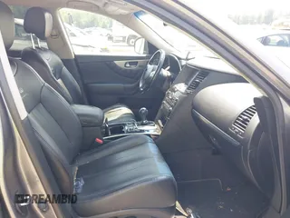 2014 Infiniti QX70 with VIN JN8CS1MW5EM411653, listed as a IAAI auction lot 42690935 with 110,806 mi miles and . Bid and sale history available at DreamBid. Image 5.