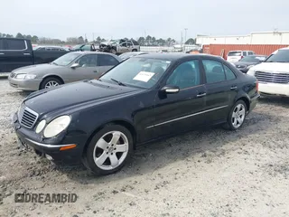 2004 Mercedes-Benz E-Class 5.0L with VIN WDBUF70J64A489519, listed as a IAAI auction lot 41675167 with 226,361 mi miles. Bid and sale history available at carsss.com. Image 2.