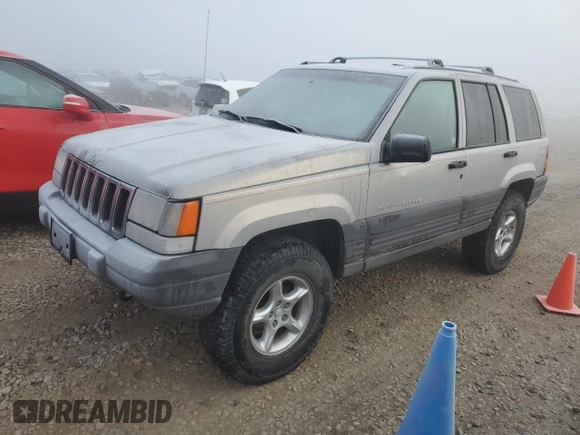 1997 Jeep Grand Cherokee Laredo with VIN 1J4GZ58Y6VC603370, listed as a Copart auction lot 82802794 with 0 mi miles and Salvage Title. Bid and sale history available at carsss.com. Image 1.