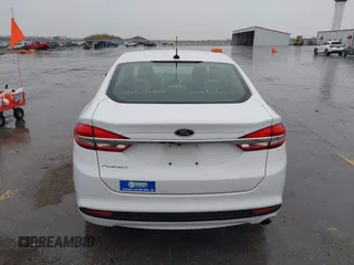 2017 Ford Fusion S with VIN 3FA6P0G72HR337120, listed as a IAAI auction lot 42173384 with 133,320 mi miles and . Bid and sale history available at DreamBid. Image 16.