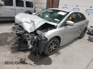 2015 Ford Focus SE with VIN 1FADP3F24FL272863, listed as a IAAI auction lot 41561084 with 103,875 mi miles. Bid and sale history available at carsss.com. Image 18.