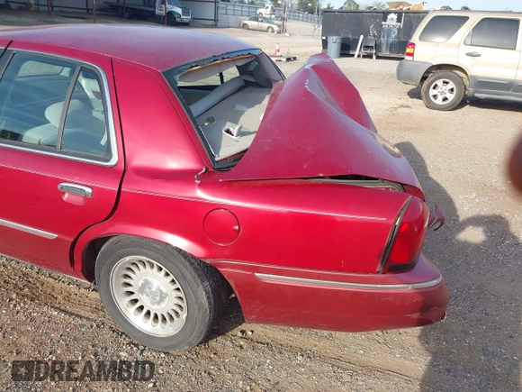 2000 Mercury Grand Marquis LS z VIN 2MEFM75W1YX736283, wystawiony jako IAAI lot #41879063 z przebiegiem 114 535 mil mil oraz . Historia ofert i sprzedaży dostępna na DreamBid. Obrazek 15.