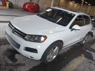 2013 Volkswagen Touareg Lux with VIN WVGEF9BP6DD007323, listed as a IAAI auction lot 41488959 with 123,383 mi miles and . Bid and sale history available at DreamBid. Image 18.