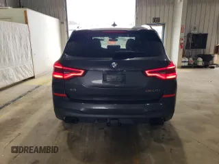 2019 BMW X3 M40i with VIN 5UXTS3C54K0Z03897, listed as a Copart auction lot 51805765 with 73,374 mi miles and Salvage Title. Bid and sale history available at DreamBid. Image 6.