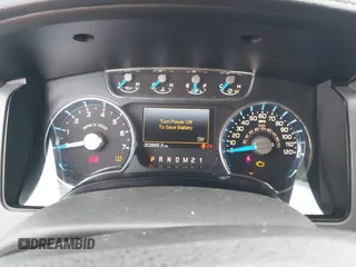 2013 Ford F-150 XL with VIN 1FTFW1ETXDKF51063, listed as a IAAI auction lot 42790441 with 303,665 mi miles and . Bid and sale history available at DreamBid. Image 7.