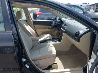 2006 Mazda Mazda6 Grand Touring s with VIN 1YVHP80DX65M52771, listed as a IAAI auction lot 42091020 with 207,727 mi miles. Bid and sale history available at carsss.com. Image 5.
