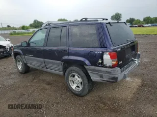 1998 Jeep Grand Cherokee Laredo with VIN 1J4GZ58SXWC144437, listed as a Copart auction lot 60437094 with 183,908 mi miles and Salvage Title. Bid and sale history available at carsss.com. Image 2.