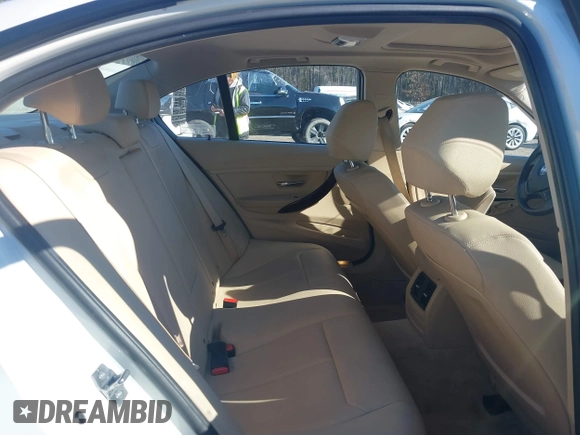 2015 BMW 3 Series 320i xDrive with VIN WBA3C3C50FK201906, listed as a IAAI auction lot 41287902 with 77,726 mi miles and . Bid and sale history available at DreamBid. Image 8.