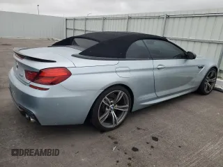 2014 BMW M6 z VIN WBSLZ9C56EDZ78719, wystawiony jako Copart lot #42445545 z przebiegiem 63 691 mil mil oraz Szkoda całkowita • Salvage title. Historia ofert i sprzedaży dostępna na DreamBid. Obrazek 3.