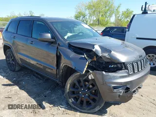 2021 Jeep Grand Cherokee Freedom z VIN 1C4RJFAG7MC777041, wystawiony jako IAAI lot #42201438 z przebiegiem 100 870 mil mil oraz . Historia ofert i sprzedaży dostępna na DreamBid. Obrazek 1.