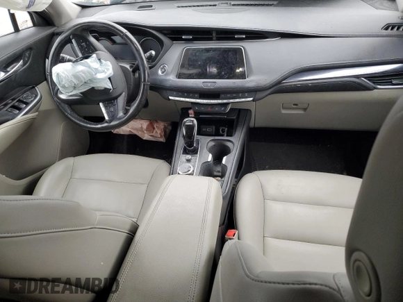 2021 Cadillac XT4 FWD Luxury z VIN 1GYAZAR48MF018135, wystawiony jako Copart lot #43023665 z przebiegiem 54 271 mil mil oraz Szkoda całkowita • Salvage title. Historia ofert i sprzedaży dostępna na DreamBid. Obrazek 8.