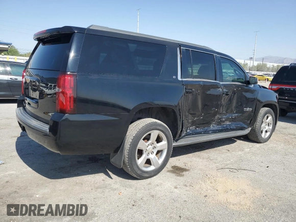 2015 Chevrolet Suburban LT with VIN 1GNSCJKC9FR732720, listed as a Copart auction lot 62564765 with 99,194 mi miles and Salvage title. Bid and sale history available at DreamBid. Image 3.