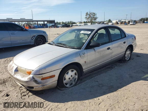 2000 Saturn SL with VIN 1G8ZH5289YZ253710, listed as a Copart auction lot 77904954 with Not provided miles and Non repairable. Bid and sale history available at DreamBid. Image 1.