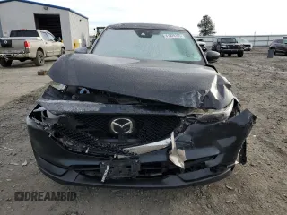 2019 Mazda CX-5 Grand Touring with VIN JM3KFBDM9K1650840, listed as a Copart auction lot 41929185 with 61,814 mi miles and Salvage Title. Bid and sale history available at carsss.com. Image 5.