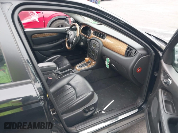 2006 Jaguar X-Type with VIN SAJWA51A16WE68650, listed as a IAAI auction lot 41461291 with 135,332 mi miles and . Bid and sale history available at DreamBid. Image 5.