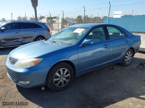 2004 Toyota Camry LE with VIN 4T1BF32K84U576050, listed as a IAAI auction lot 41993841 with 101,702 mi miles. Bid and sale history available at carsss.com. Image 15.
