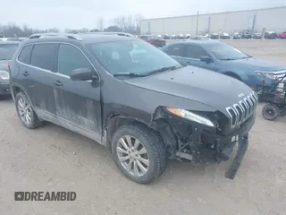 2018 Jeep Cherokee Overland with VIN 1C4PJMJX5JD594240, listed as a IAAI auction lot 41285832 with 130,334 mi miles. Bid and sale history available at carsss.com. Image 1.