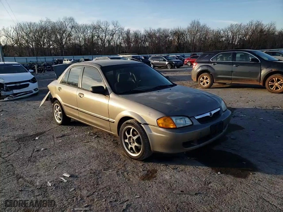 2000 Mazda Protege DX with VIN JM1BJ2222Y0238301, listed as a Copart auction lot 85283554 with 326,226 mi miles and Non Repairable. Bid and sale history available at carsss.com. Image 11.