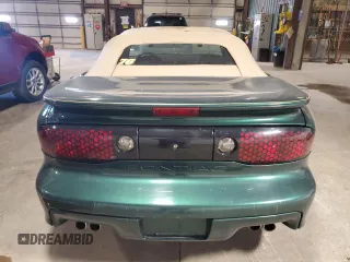 1995 Pontiac Firebird Trans Am z VIN 2G2FV32P3S2211318, wystawiony jako Copart lot #60168445 z przebiegiem 91 250 mil mil oraz Czysty tytuł • Clean title. Historia ofert i sprzedaży dostępna na DreamBid. Obrazek 6.