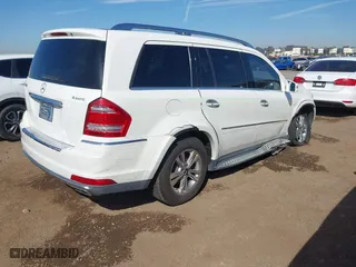 2011 Mercedes-Benz GL-Class GL 550 with VIN 4JGBF8GE7BA749183, listed as a IAAI auction lot 41626371 with 132,215 mi miles. Bid and sale history available at carsss.com. Image 4.