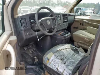 2010 Chevrolet Express Cargo with VIN 1GCUGADX1A1172060, listed as a Copart auction lot 58779905 with 456,288 mi miles and Salvage title. Bid and sale history available at DreamBid. Image 8.