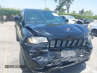 2018 Jeep Grand Cherokee Altitude with VIN 1C4RJEAG2JC428536, listed as a IAAI auction lot 42472960 with 74,631 mi miles and . Bid and sale history available at DreamBid. Image 6.