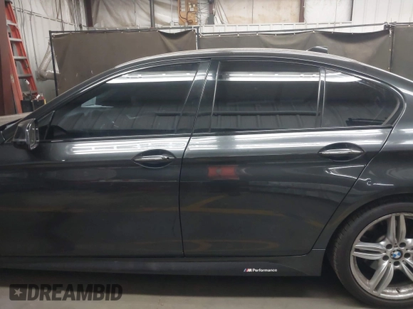 2015 BMW 5 Series 535i with VIN WBA5B1C50FD922067, listed as a IAAI auction lot 42121812 with 146,205 mi miles and . Bid and sale history available at carsss.com. Image 15.