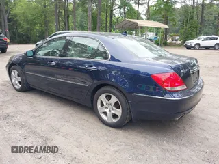 2006 Acura RL z VIN JH4KB16566C007214, wystawiony jako IAAI lot #42510457 z przebiegiem 160 005 mil mil oraz . Historia ofert i sprzedaży dostępna na DreamBid. Obrazek 3.