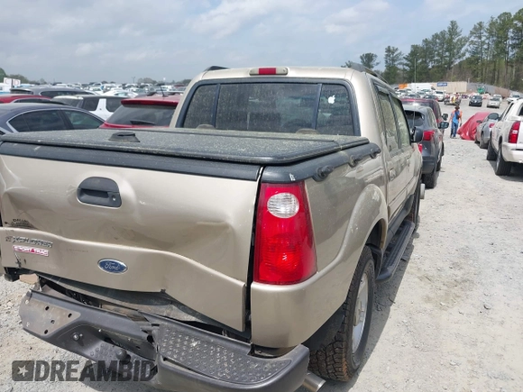 2002 Ford Explorer Sport Trac Value z VIN 1FMZU67E32UB39918, wystawiony jako IAAI lot #41937332 z przebiegiem 201 713 mil mil oraz . Historia ofert i sprzedaży dostępna na DreamBid. Obrazek 4.