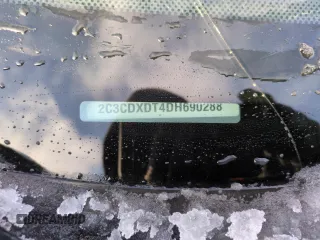 2013 Dodge Charger RT Plus with VIN 2C3CDXDT4DH690288, listed as a Copart auction lot 45912405 with 127,088 mi miles and Salvage Title. Bid and sale history available at carsss.com. Image 13.