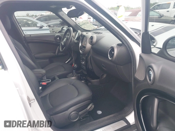 2012 MINI Countryman z VIN WMWZB3C56CWM04087, wystawiony jako IAAI lot #42180040 z przebiegiem 37 789 mil mil oraz . Historia ofert i sprzedaży dostępna na DreamBid. Obrazek 5.