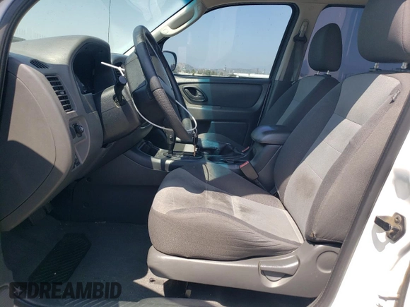 2006 Ford Escape XLS with VIN 1FMCU02Z36KA71926, listed as a Copart auction lot 57697364 with 225,212 mi miles and Salvage title. Bid and sale history available at DreamBid. Image 7.