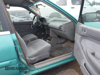 1994 Ford Escort z VIN 3FARP13J0RR121191, wystawiony jako IAAI lot #42202443 z przebiegiem 111 111 mil mil oraz . Historia ofert i sprzedaży dostępna na DreamBid. Obrazek 5.