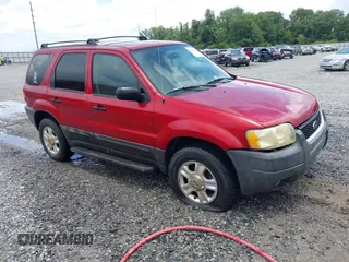 2004 Ford Escape XLT with VIN 1FMYU03164KA30296, listed as a IAAI auction lot 42423140 with 227,461 mi miles and . Bid and sale history available at DreamBid. Image 1.