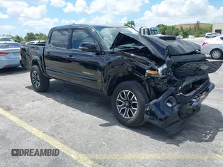 2020 Toyota Tacoma SR5 z VIN 3TMAZ5CN7LM129496, wystawiony jako IAAI lot #39945333 z przebiegiem 140 154 mil mil oraz . Historia ofert i sprzedaży dostępna na DreamBid. Obrazek 1.