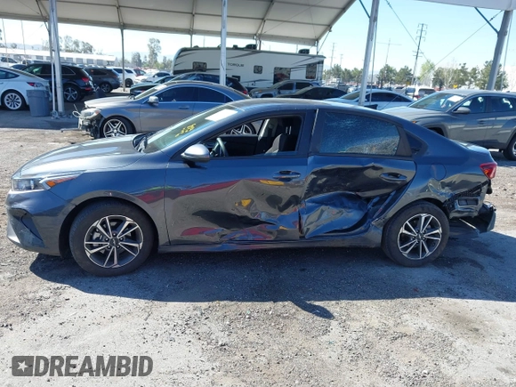 2023 Kia Forte LXS with VIN 3KPF24AD6PE648764, listed as a IAAI auction lot 41866394 with 26,341 mi miles and . Bid and sale history available at DreamBid. Image 14.