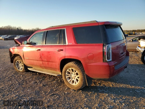 2015 GMC Yukon SLE with VIN 1GKS2AKC2FR190537, listed as a Copart auction lot 87075244 with 244,267 mi miles and Salvage Title. Bid and sale history available at carsss.com. Image 2.