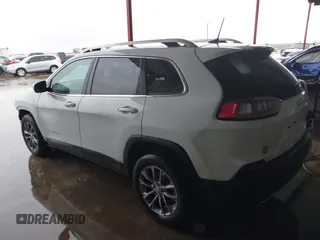 2021 Jeep Cherokee Latitude Lux with VIN 1C4PJLMX7MD221078, listed as a IAAI auction lot 41548159 with 67,780 mi miles and . Bid and sale history available at DreamBid. Image 3.