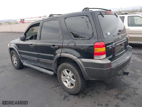 2006 Ford Escape XLT with VIN 1FMYU03156KA42961, listed as a IAAI auction lot 41820423 with 168,212 mi miles. Bid and sale history available at carsss.com. Image 3.