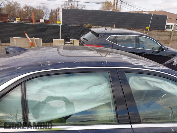 2016 Cadillac CTS Luxury Collection AWD with VIN 1G6AX5SX5G0180953, listed as a IAAI auction lot 41005332 with Not Provided miles and . Bid and sale history available at DreamBid. Image 17.