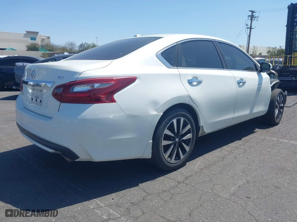 2018 Nissan Altima 2.5 SV with VIN 1N4AL3AP4JC186544, listed as a IAAI auction lot 41892390 with 113,384 mi miles. Bid and sale history available at carsss.com. Image 4.