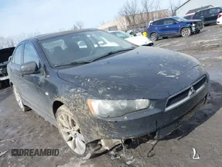 2009 Mitsubishi Lancer GTS with VIN JA3AU86W69U024424, listed as a IAAI auction lot 41504794 with 160,656 mi miles. Bid and sale history available at carsss.com. Image 1.