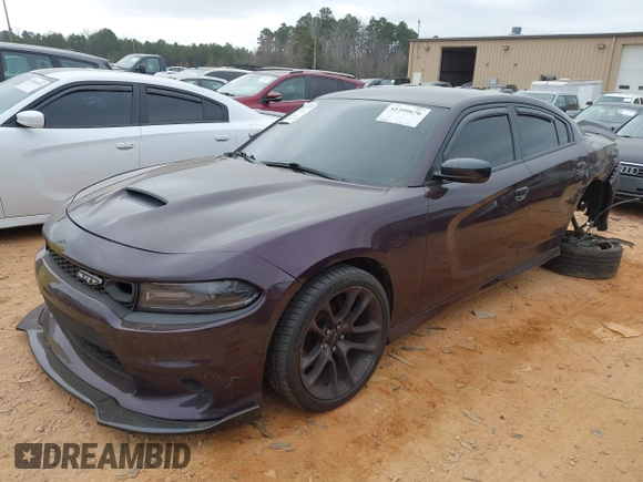 2021 Dodge Charger Scat Pack Widebody with VIN 2C3CDXGJ5MH579324, listed as a IAAI auction lot 41399676 with 77,156 mi miles and . Bid and sale history available at DreamBid. Image 2.