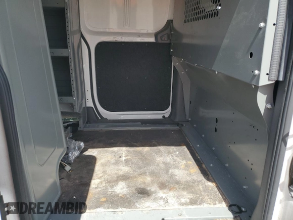 2018 Nissan NV200 SV z VIN 3N6CM0KN8JK692056, wystawiony jako Copart lot #76067534 z przebiegiem 100 077 mil mil oraz Szkoda całkowita • Salvage title. Historia ofert i sprzedaży dostępna na DreamBid. Obrazek 11.