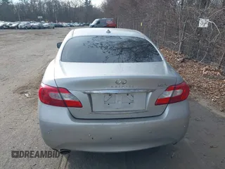 2013 Infiniti M z VIN JN1BY1AR0DM600278, wystawiony jako IAAI lot #41303485 z przebiegiem 298 943 mil mil oraz . Historia ofert i sprzedaży dostępna na DreamBid. Obrazek 16.