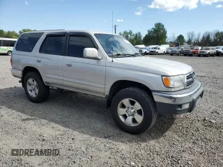 1999 Toyota 4Runner SR5 with VIN JT3GN86R7X0106125, listed as a Copart auction lot 55814775 with 292,758 mi miles and Clean Title. Bid and sale history available at DreamBid. Image 4.