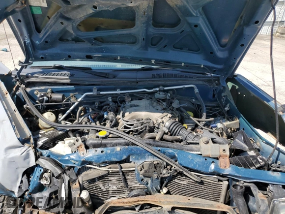 2003 Nissan Frontier XE with VIN 1N6ED26Y03C462996, listed as a Copart auction lot 69848804 with Not provided miles and Salvage title. Bid and sale history available at DreamBid. Image 12.