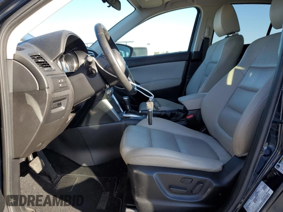 2014 Mazda CX-5 Grand Touring with VIN JM3KE4DY1E0405493, listed as a Copart auction lot 41688915 with 94,970 mi miles and Salvage Title. Bid and sale history available at carsss.com. Image 7.